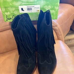 Gently used black suede fringed heel boots. Worn only 1 time. Beautiful boots.